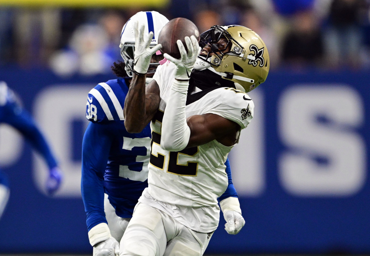 Oct 29, 2023; Indianapolis, Indiana, USA; New Orleans Saints wide receiver Rashid Shaheed (22) catches a long pass in front of Indianapolis Colts cornerback Tony Brown (38) during the second half at Lucas Oil Stadium.